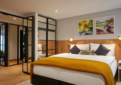 Visit Graubunden Hard Rock Studio Suite King Gold Bedroom